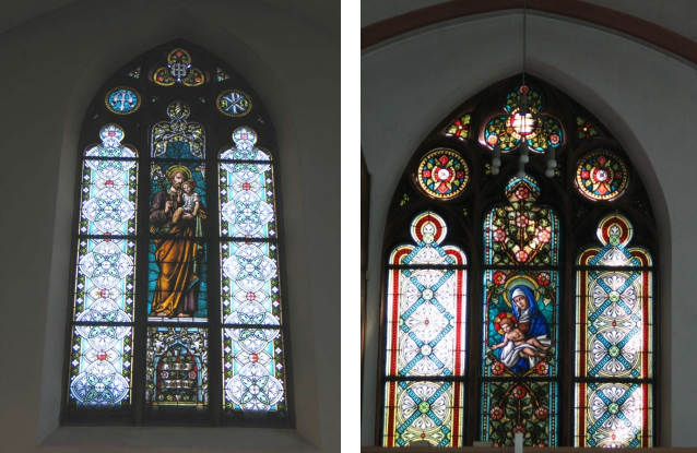 Buntglasfenster in einer Kirche mit Darstellungen des hl. Josef und der hl. Maria